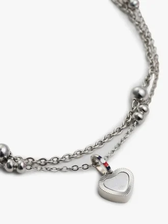 Bracelet double rangée avec breloque en forme de cœur