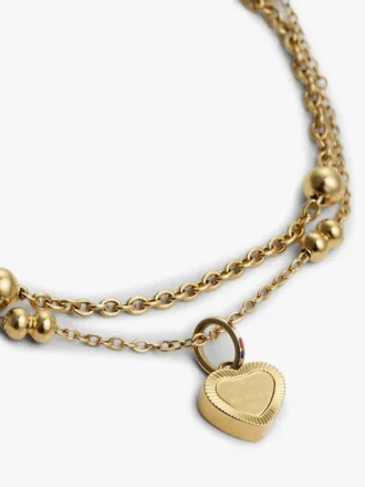 Bracelet double rangée avec breloque en forme de cœur