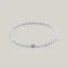 Bracelet à perles métalliques rayées
