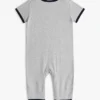 Combinaison pour bébés avec logo drapeau