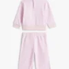 Ensemble de bébés composé d&rsquo;un haut à étoiles et d&rsquo;un pantalon à jambes larges