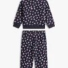 Ensemble de bébés composé d&rsquo;un haut à étoiles et d&rsquo;un pantalon à jambes larges