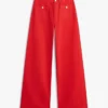 Jeans taille haute à jambes larges et ourlet brut