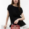 Micro-sac fourre-tout en cuir gaufré serpent Micro-sac fourre-tout en cuir gaufré serpent
