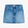Mini-jupe en denim taille haute avec motif de blason sur toute la surface Mini-jupe en denim taille haute avec motif de blason sur toute la surface
