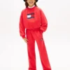 Pantalon de survêtement pour enfant avec logo drapeau ondulé Pantalon de survêtement pour enfant avec logo drapeau ondulé