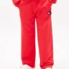 Pantalon de survêtement pour enfant avec logo drapeau ondulé Pantalon de survêtement pour enfant avec logo drapeau ondulé