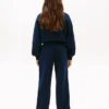 Pantalon de survêtement pour enfant avec logo drapeau ondulé Pantalon de survêtement pour enfant avec logo drapeau ondulé