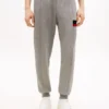 Pantalon de survêtement à rayures emblématiques Pantalon de survêtement à rayures emblématiques