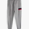 Pantalon de survêtement à rayures emblématiques Pantalon de survêtement à rayures emblématiques
