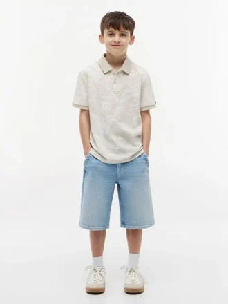 Polo stretch à imprimé tropical pour enfant