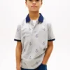 Polo stretch pour enfant avec logo nautique sur toute la surface Polo stretch pour enfant avec logo nautique sur toute la surface