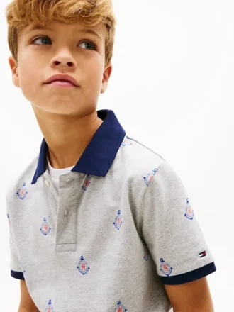 Polo stretch pour enfant avec logo nautique sur toute la surface Polo stretch pour enfant avec logo nautique sur toute la surface