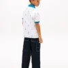 Polo stretch pour enfant avec logo nautique sur toute la surface