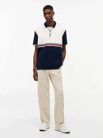 Polo Tommy Jeans Relaxed à fermeture éclair quart de longueur Polo Tommy Jeans Relaxed à fermeture éclair quart de longueur