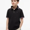 Polo Tommy Wicking pour enfant Polo Tommy Wicking pour enfant
