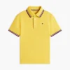 Polo Tommy Wicking pour enfant Polo Tommy Wicking pour enfant
