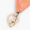 Porte-monnaie orange en forme de coin