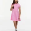 Robe patineuse pour enfant avec logo drapeau ton sur ton Robe patineuse pour enfant avec logo drapeau ton sur ton