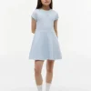 Robe patineuse pour enfant avec logo drapeau ton sur ton Robe patineuse pour enfant avec logo drapeau ton sur ton