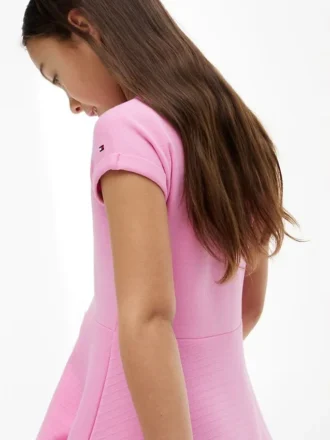 Robe patineuse pour enfant avec logo drapeau ton sur ton Robe patineuse pour enfant avec logo drapeau ton sur ton
