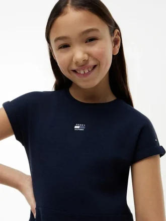 Robe patineuse pour enfant avec logo drapeau ton sur ton Robe patineuse pour enfant avec logo drapeau ton sur ton