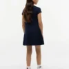Robe patineuse pour enfant avec logo drapeau ton sur ton Robe patineuse pour enfant avec logo drapeau ton sur ton