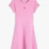 Robe patineuse pour enfant avec logo drapeau ton sur ton Robe patineuse pour enfant avec logo drapeau ton sur ton