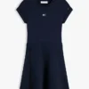 Robe patineuse pour enfant avec logo drapeau ton sur ton Robe patineuse pour enfant avec logo drapeau ton sur ton