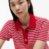 Robe polo rayée en interlock avec boutons dorés Robe polo rayée en interlock avec boutons dorés