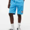 Short de survêtement pour enfant avec logo drapeau Short de survêtement pour enfant avec logo drapeau