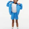 Short de survêtement pour enfant avec logo drapeau ton sur ton Short de survêtement pour enfant avec logo drapeau ton sur ton