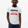 T-shirt à chevrons Tommy x Cadillac F1® Team pour enfants T-shirt à chevrons Tommy x Cadillac F1® Team pour enfants