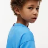 T-shirt pour enfants avec logo drapeau ton sur ton T-shirt pour enfants avec logo drapeau ton sur ton