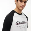 T-shirt raglan Tommy x Cadillac F1® Team T-shirt raglan Tommy x Cadillac F1® Team